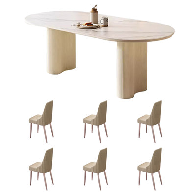 Table et chaises de salle à manger ovales de style crème