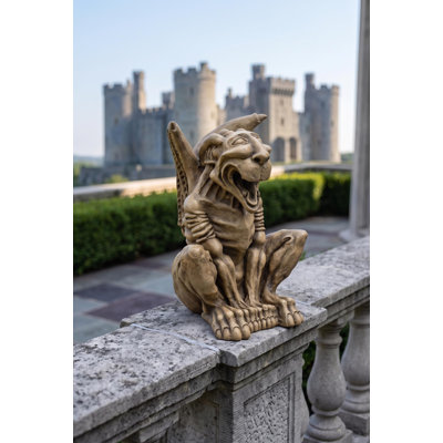 Statue gargouille rire leo