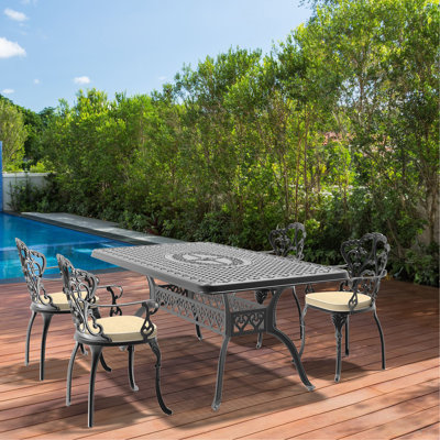 5-Piece Set Of Cast Aluminum Patio Furniture With Black Frame And Off-White Seat Cushions