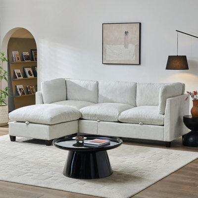 Canapé modulaire en L de 96,5 pouces avec repose-pieds, revêtement en chenille douce, coussins à ressorts et en mousse, rangement intégré et structure en bois massif stable pour le salon.