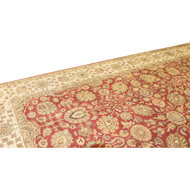 Tapis rouge et ivoire de haute qualité noué à la main