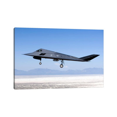 F-117 Nighthawk Flies A Training Sortie Over New Mexico by HIGH-G Productions - Wrapped Canvas Print