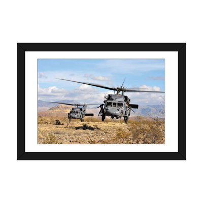 " Two HH-60 Pave Hawk Helicopters Preparing To Land " by Stocktrek Images