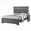 Grand lit plateforme capitonné en similicuir gris foncé avec base DEL en bois massif pour chambre d'amis principale