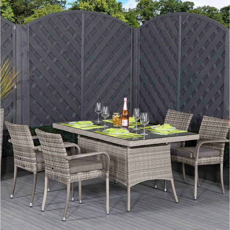 Etheridge 4 - Person Patio Dining Set with Rectangular Table , Cushions Included