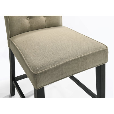 Ensemble de 2 chaises à hauteur de comptoir en tissu beige avec pieds à finition noire, parfait pour un repas moderne et confortable
