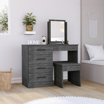 Coiffeuse de maquillage avec quatre tiroirs, un miroir et un tabouret
