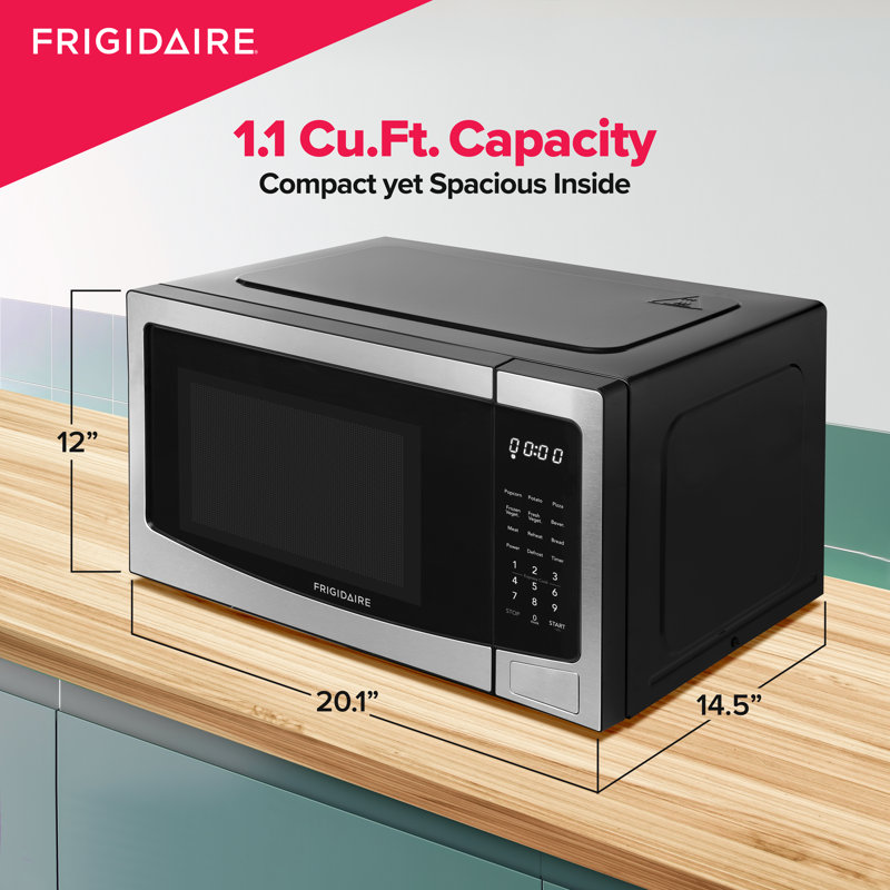 Frigidaire Pi. Four à micro-ondes de comptoir, 1000 watts, 10 niveaux de puissance, acier inoxydable