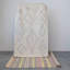 Tapis rayé en jute et coton