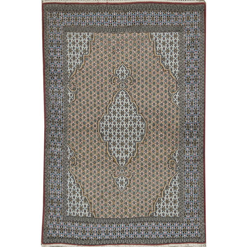 Tapis ivoire noué à la main de haute qualité