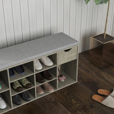 Banc à chaussures à 3 niveaux avec coussin rembourré, tiroir et compartiments ouverts pour le rangement et les sièges de l'entrée