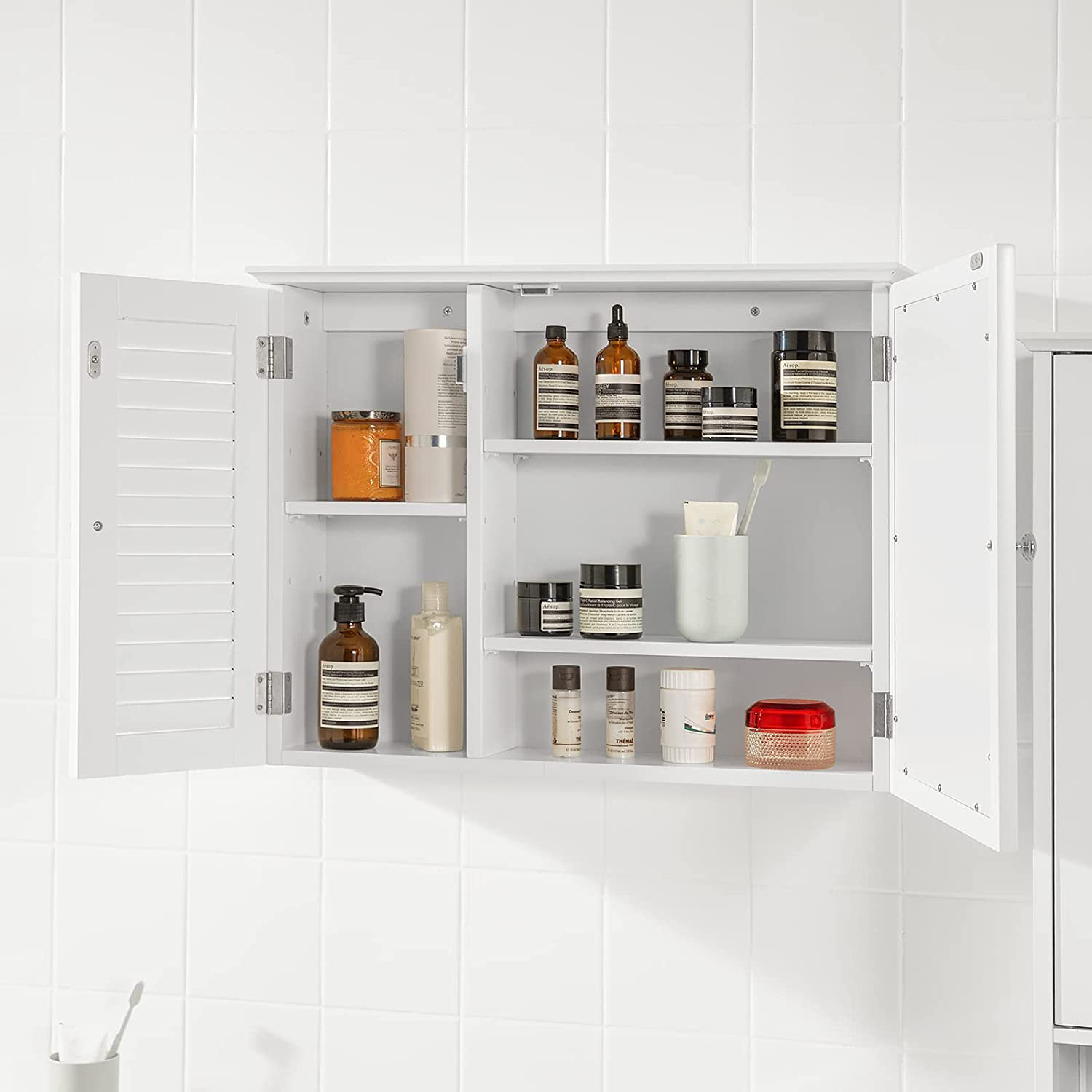 https://assets.wfcdn.com/im/56098313/compr-r85/2212/221221249/jafus-256-w-193-h-surface-framed-medicine-cabinet-with-mirror-and-4-adjustable-shelves.jpg