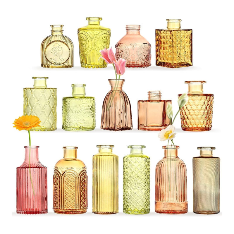 Ensemble de 15 vases à fleurs en verre coloré