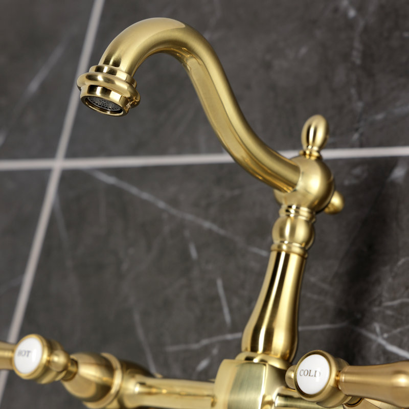 Kingston Brass Heirloom Double-Handle 2-Hole Wall-Mount Bridge Kitchen Faucet, Brushed Brass
