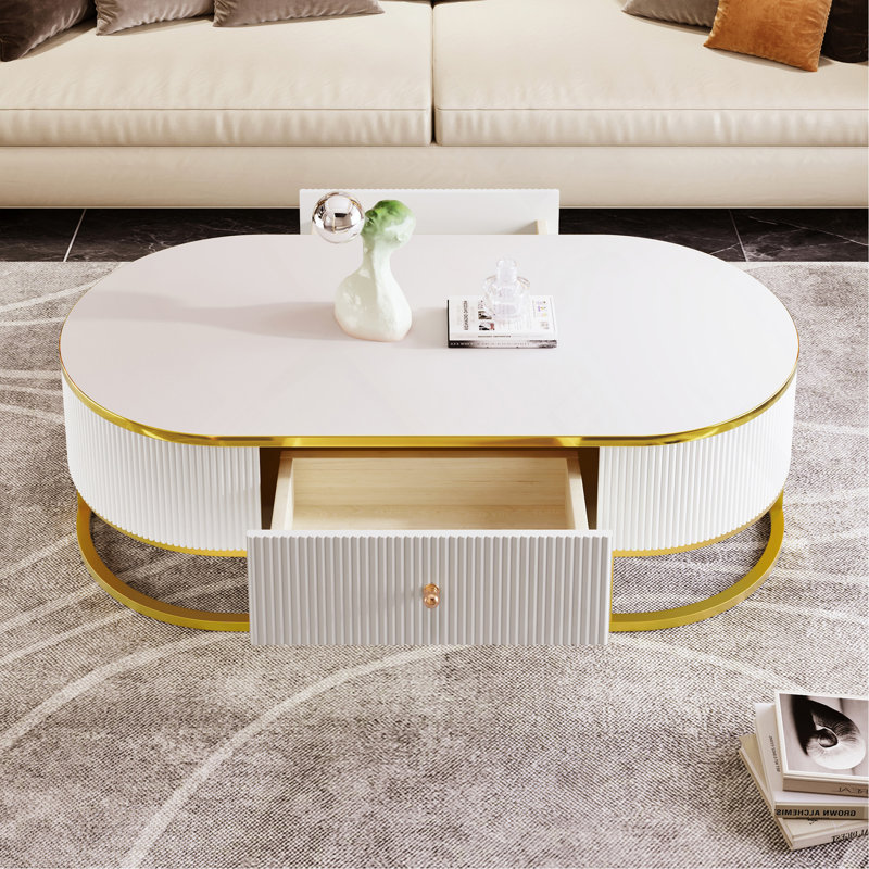 Table basse moderne ovale avec tiroirs, conception à profil incurvé, décor en métal doré, table centrale pour le salon