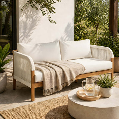 Acacia Wood Daybed with Woven Rope, Plush Cushions for Outdoor Relaxation and Durable Comfort.