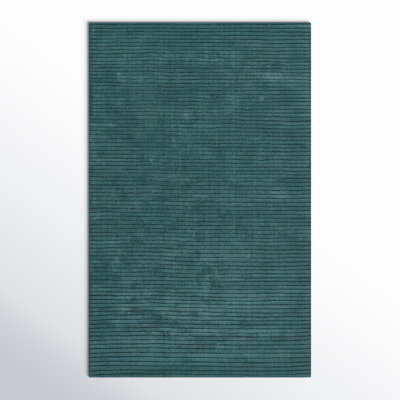 Guiness Solid Color Hand Loomed Wool Area Rug in Blue