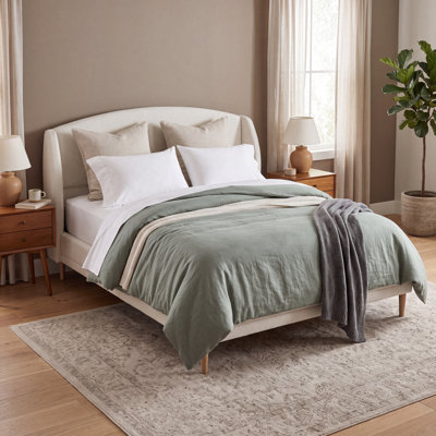 Lit plateforme tapissier Romano Boucle