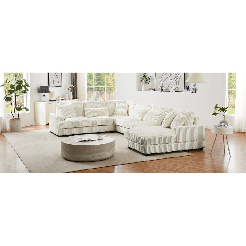 Canapé d'angle en velours côtelé beige avec méridienne pour un confort optimal, canapé en forme de U, tissu doux et coussins carrés