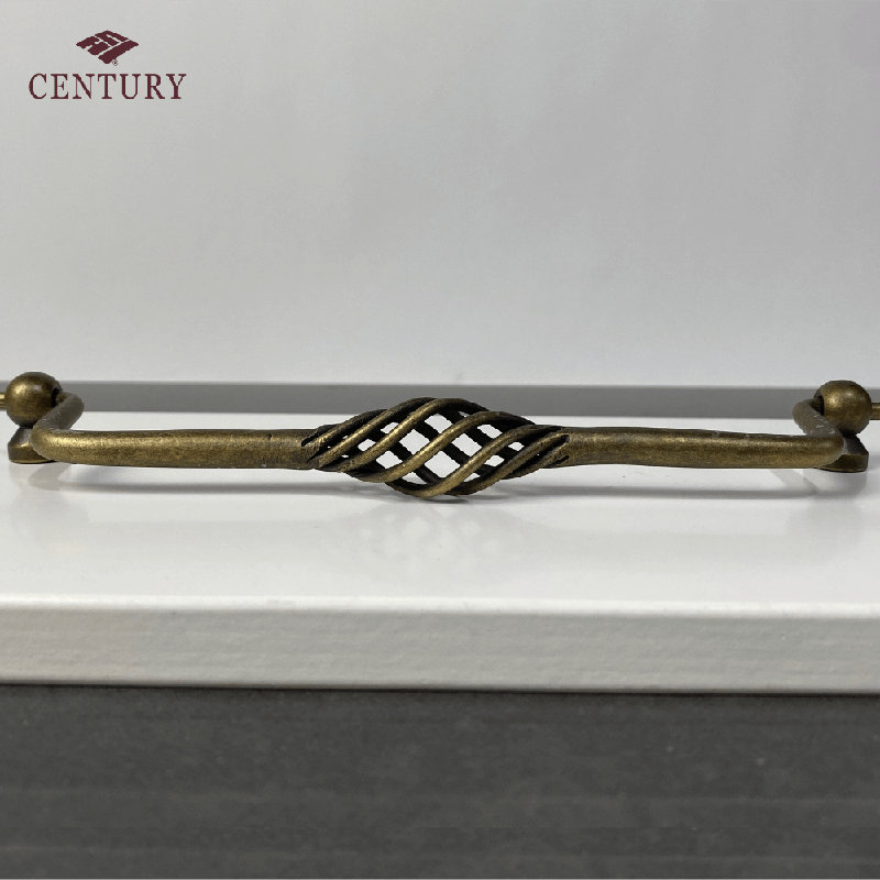 Poignée cage 5 po Orleans, Laiton antique, 7 1/2"
