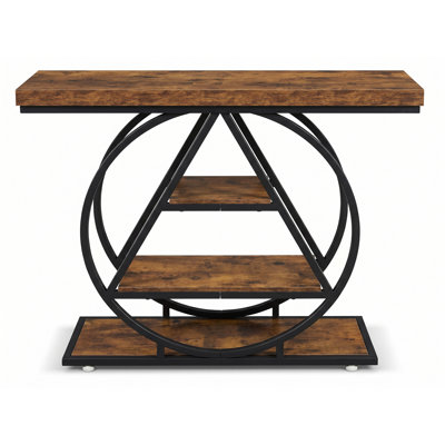 Console ronde en métal au fini brûlé et en bois d'ingénierie, idéale pour une entrée, un couloir étroit, un hall d'entrée ou un salon, derrière un canapé. Style industriel, parfait pour exposer des vases, des lampes, des livres et des objets décoratifs.