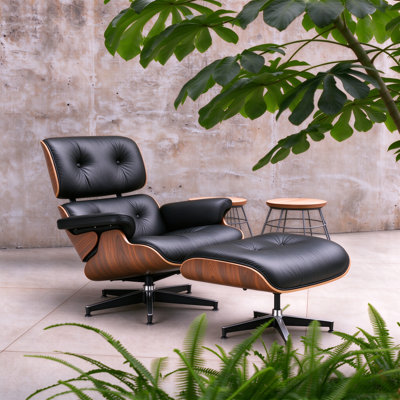 Black genuine leather mid-century modern lounge chair with rosewood-tone open-pore wood shell, button-tufted seat and backrest