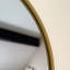 Emi - Gold Metal Runway Oval Wall Mirror-134434391