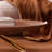 Chebo Retro Oval Coffee Table with Wood Grain Finish and Gold Metal Legs