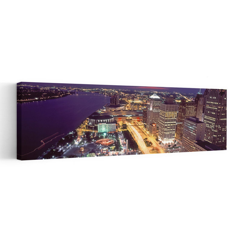 Buildings In A Downtown District At Night Detroit Wayne County Michigan USA by Vito Palmisano - Wrapped Canvas Panoramic Print