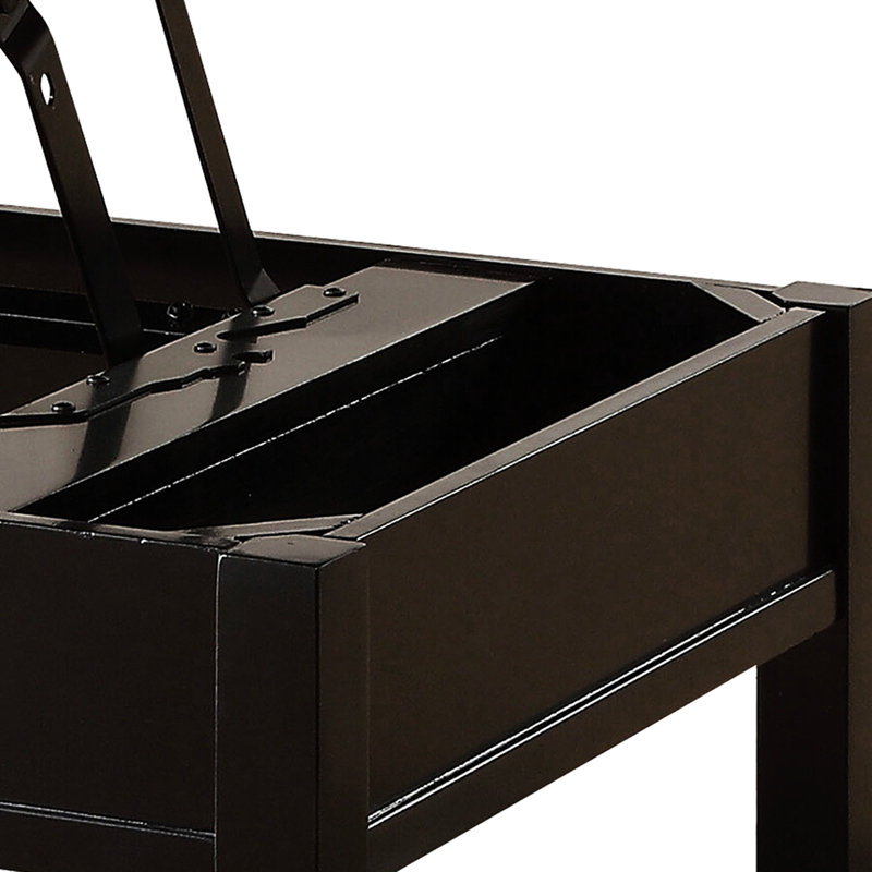 Table basse moderne noire avec plateau relevable et tablette pour le rangement