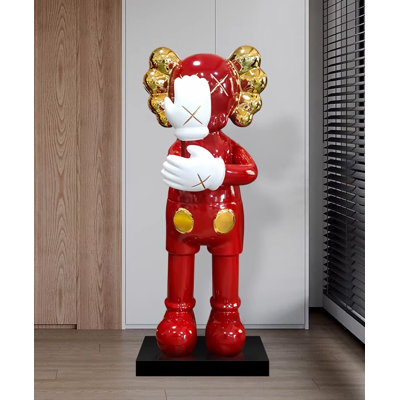 KAWS - Inspired large black and gold resin sculpture with plated details and marble base
