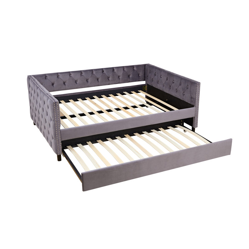 Canapé-lit polyvalent avec des détails élégants pour le confort de la maison