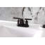 Robinet de salle de bain central à 4 poignées à 3 trous avec bonde escamotable Kingston Brass Kingston-95752716