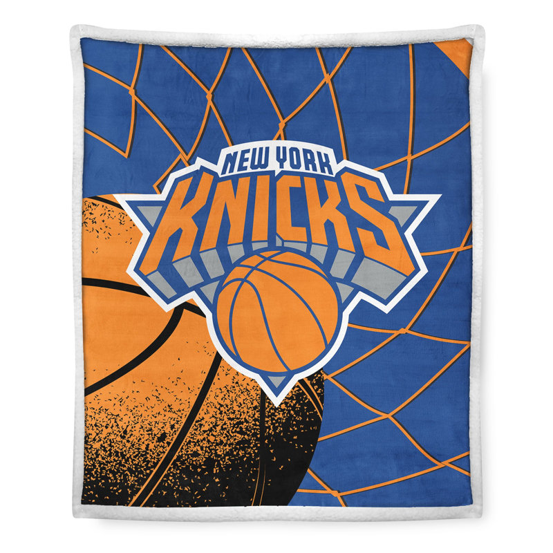 Couverture NBA NEW YORK KNICKS sous licence officielle, 127 x 152 cm, avec revers en fausse fourrure de mouton.