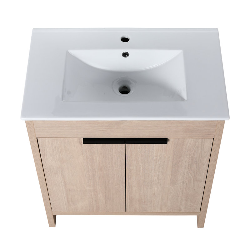 Meuble-lavabo autoportant de salle de bain, 30 po Lavabo en céramique blanche et 2 portes. Moderne. Chêne uni. Contreplaqué. Tablette réglable. Poignées en métal pour un joli meuble-lavabo de 30 po avec lavabo. Conception moderne de l'armoire à fermeture en douceur.