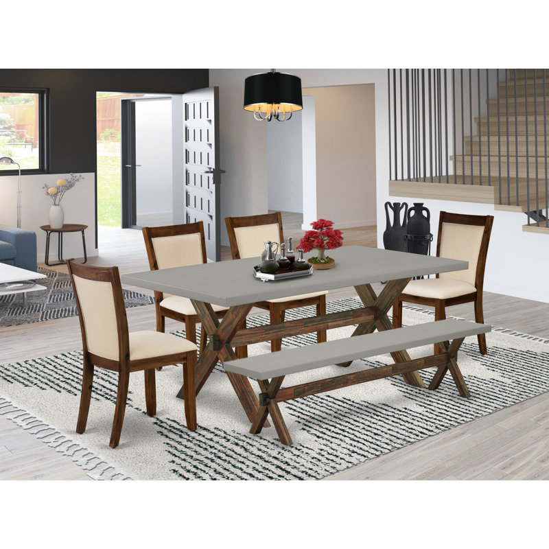 L'ensemble de salle à manger 6 pièces contient une table de salle à manger rectangulaire avec des pieds en X et 4 chaises Parson en tissu de café avec un banc, patiné