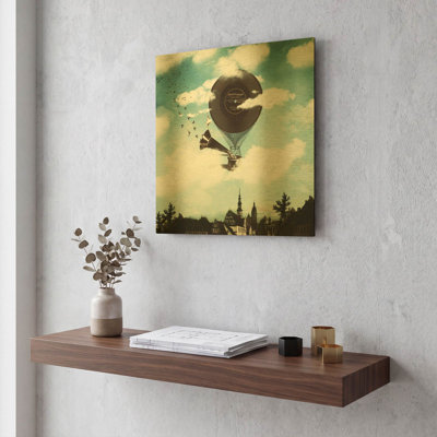 «The Travelling Ballerina» par Paula Belle Flores, art mural en métal doré, 12 po x 12 po