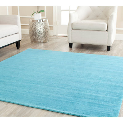 Tapis en laine turquoise touffeté à la main Moreau