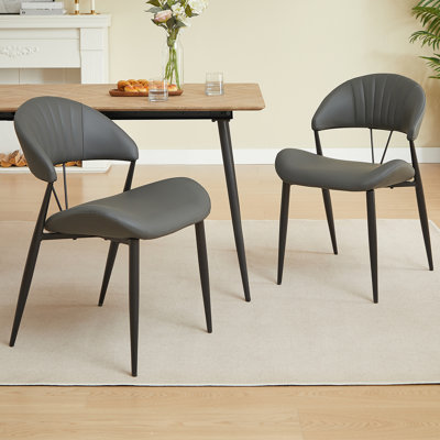 Ensemble de 2 chaises de salle à manger en polyuréthane, chaises d'appoint modernes avec coutures à oreilles, chaises de cuisine rembourrées pour petits espaces, dossier incurvé confortable avec pieds en métal noir robuste (gris)