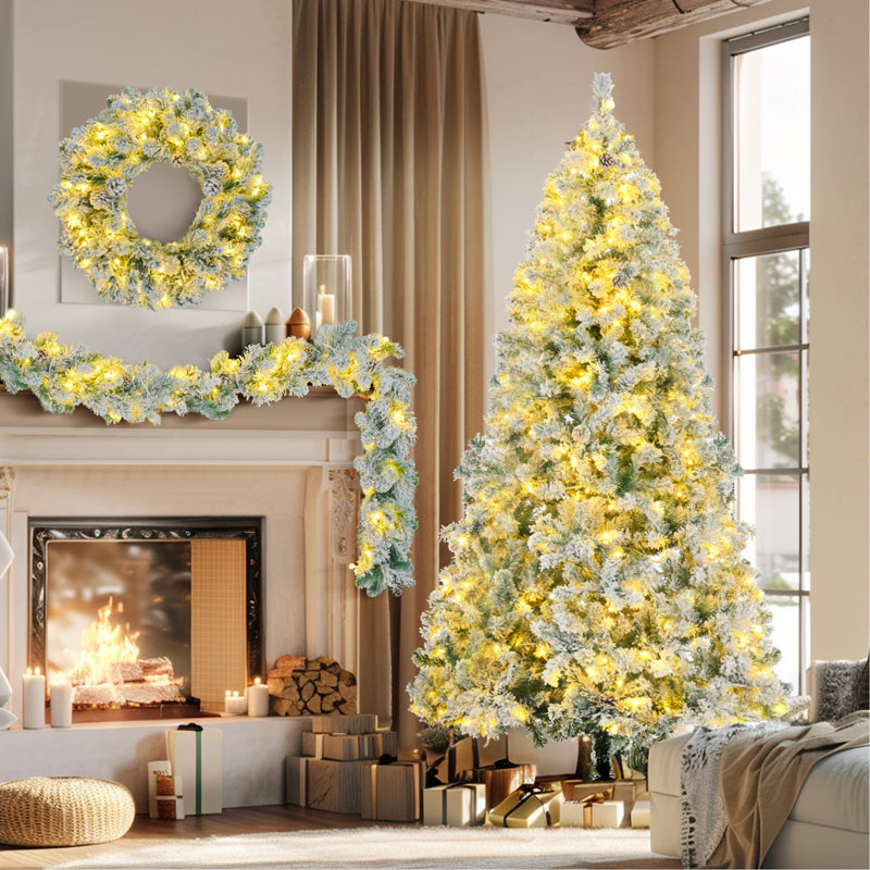 Arbre de Noël enneigé 6 pi, ensemble illuminé avec arbre, guirlande et couronne, arbre de Noël articulé artificiel avec lumières DEL colorées, 8 modes d'éclairage, pommes de pin, décoration des Fêtes pour la maison
