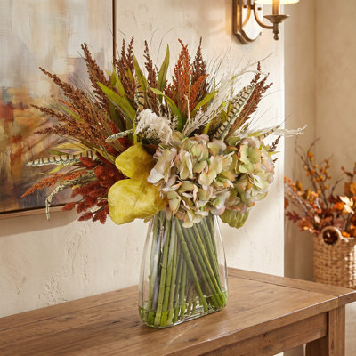 Arrangement d'automne avec bruyères et hortensias assortis