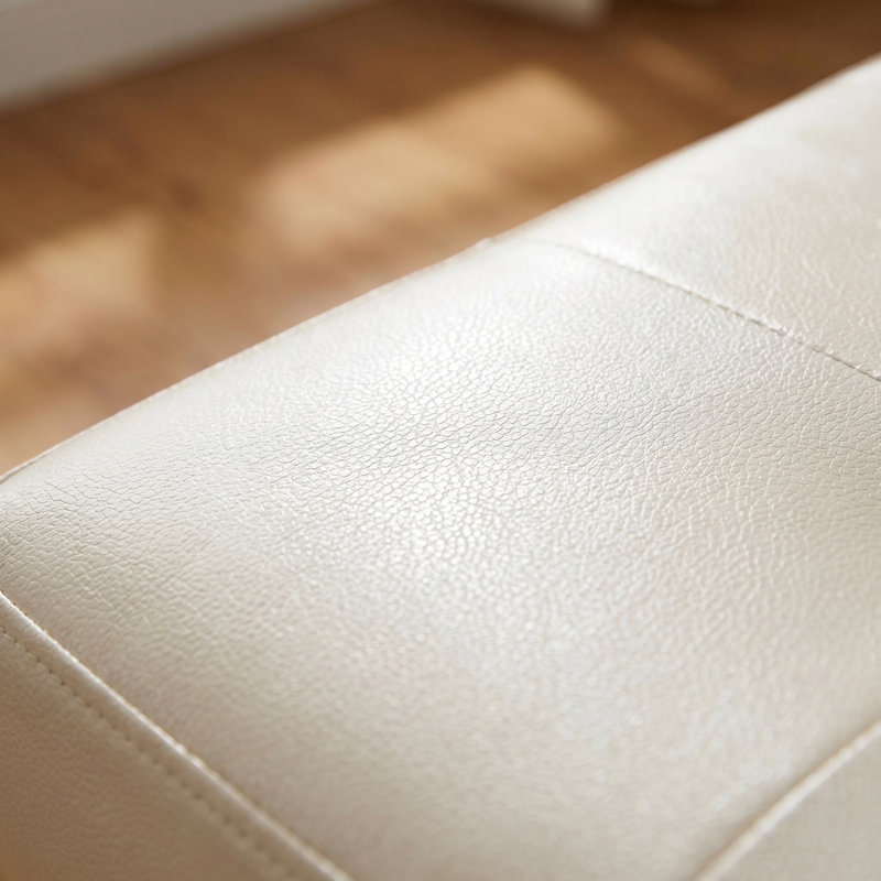 Banc de rangement avec repose-pieds blanc capitonné en similicuir