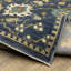 Tapis oriental en polypropylène tissé à la machine en bleu / or / vert Marchia-1020771129