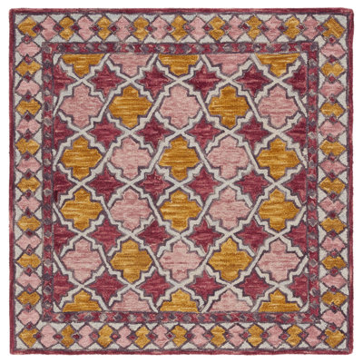 Butlin Hand Tufted Wool/Cotton Southwestern Rug in Yellow/Pink