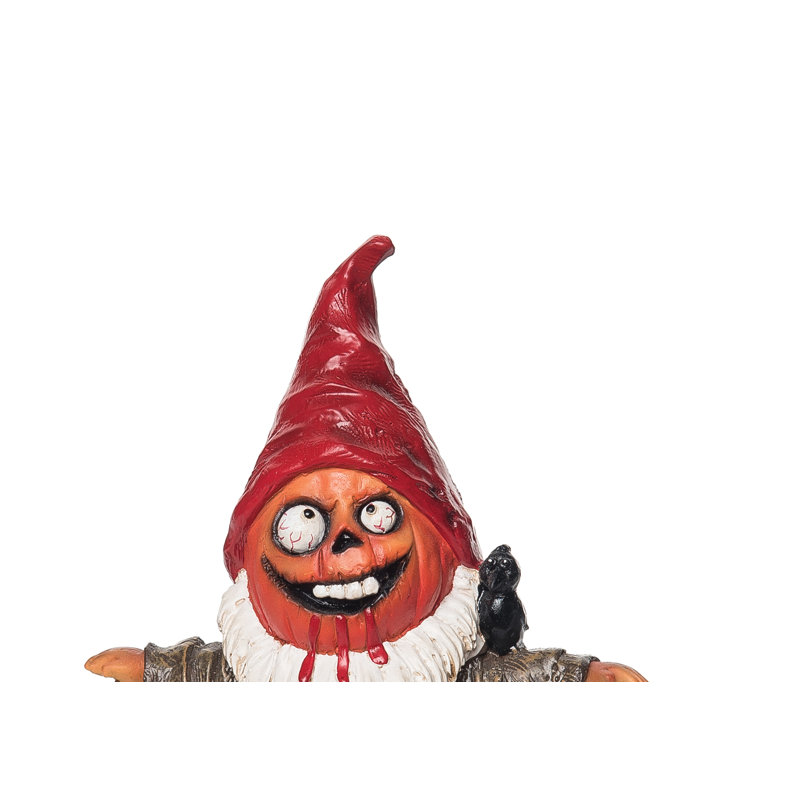 Gnome avec citrouille d'Halloween
