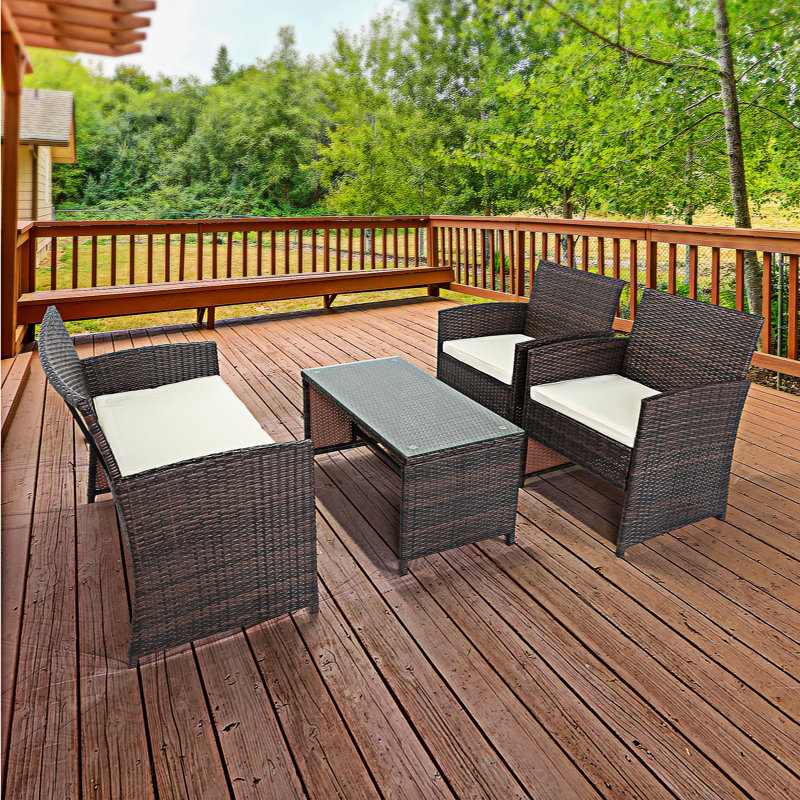 Mancero 4 - Person Patio Dining Set with Rectangular Table , Cushions Included