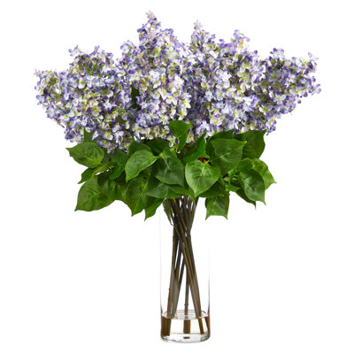Arrangement floral lilas Alvarado dans un vase