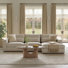 Canapé modulaire de 122,4 po avec coussins réversibles en mélange de plumes et coussin lombaire amovible.