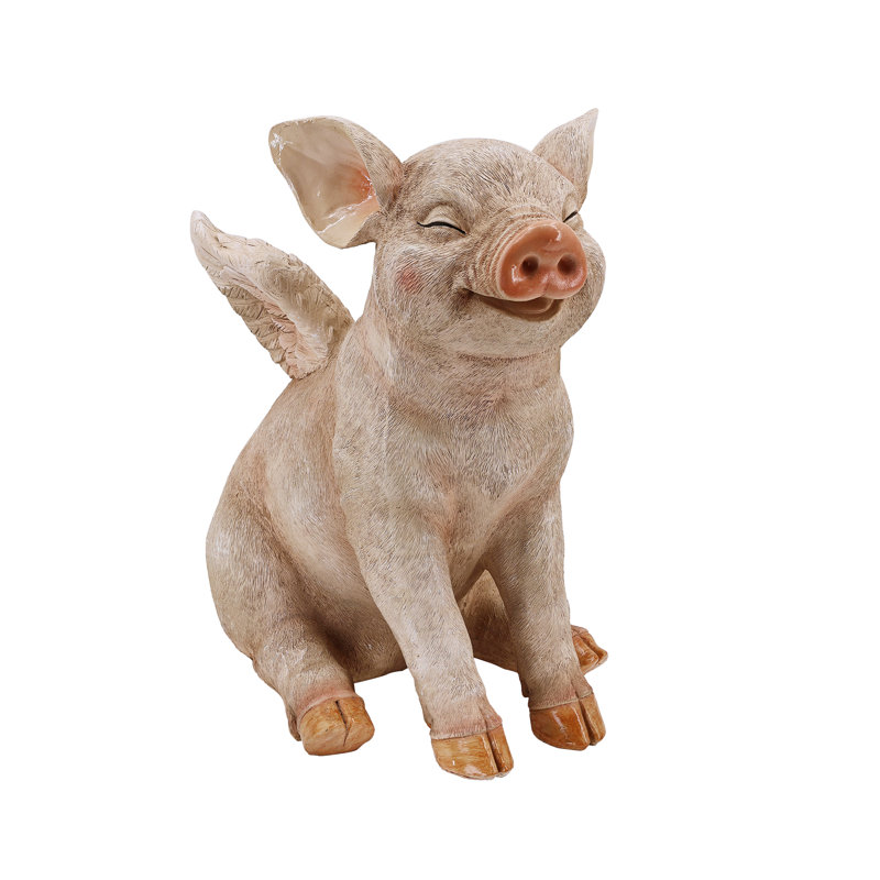 Cochon souriant avec des ailes assis