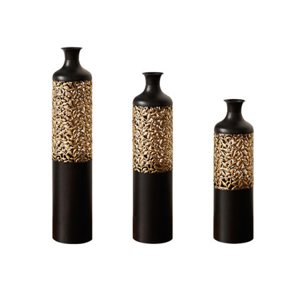 Handcrafted Metal Floor Vase Set With Black Matte Finish And Gold Cutout Patterns For Modern Glam Living Room And Entryway Decor.